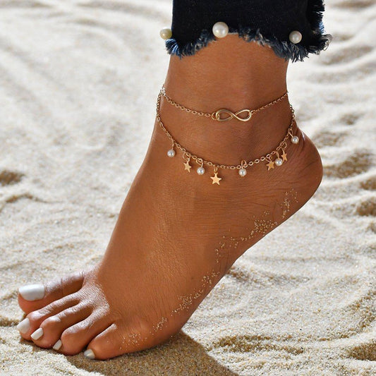 Anklet with pearls, stars and infinity symbol